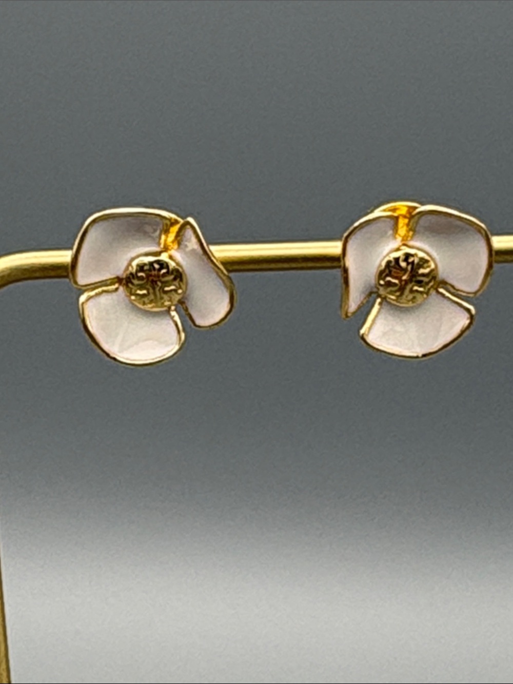 Tory Burch Gold Tone White Enamel Floral Stud Earrings